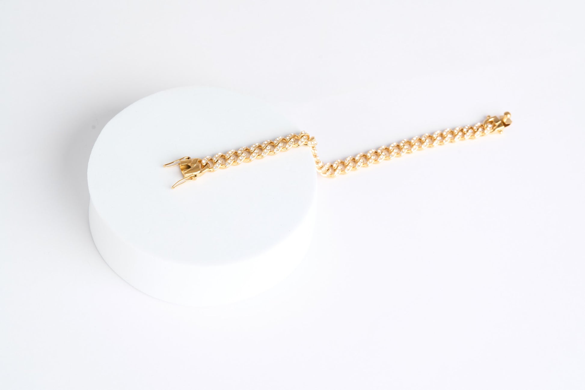 Gold necklace on a white background