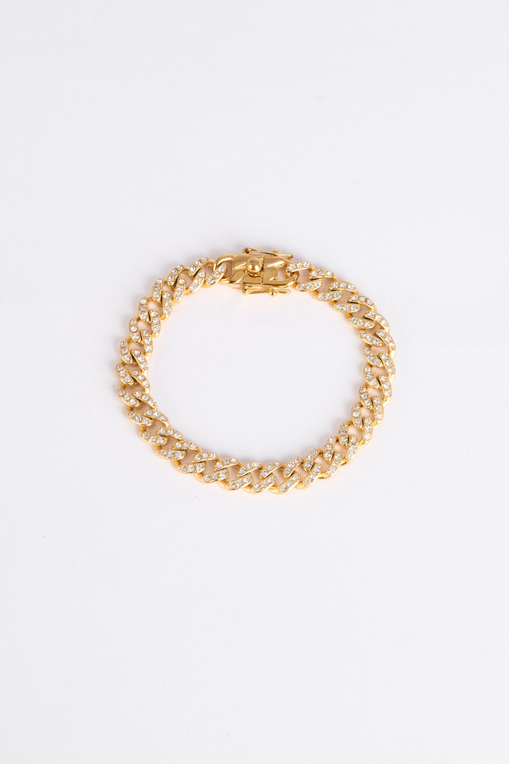Gold chain bracelet on a white background