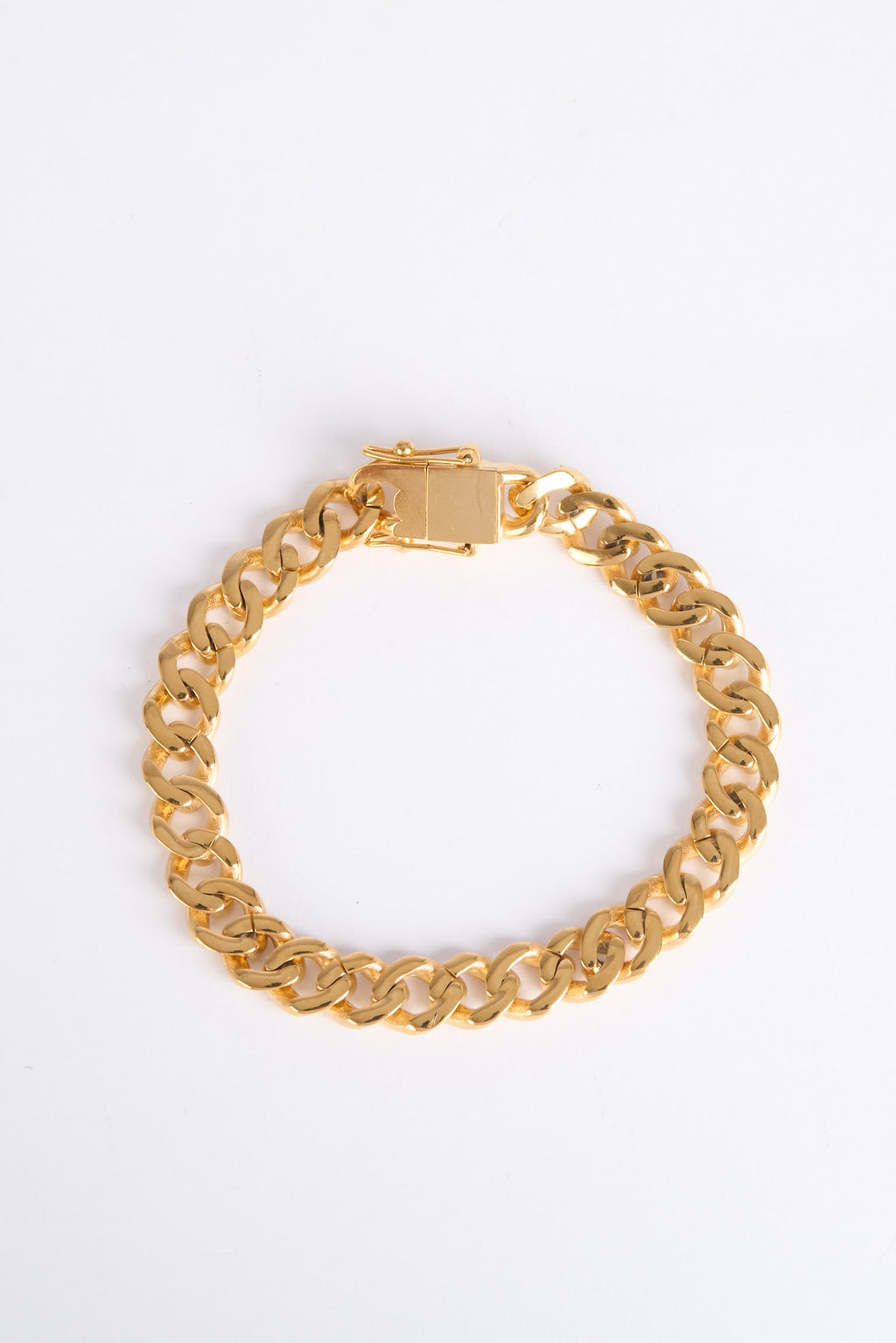 Gold chain bracelet on a white background