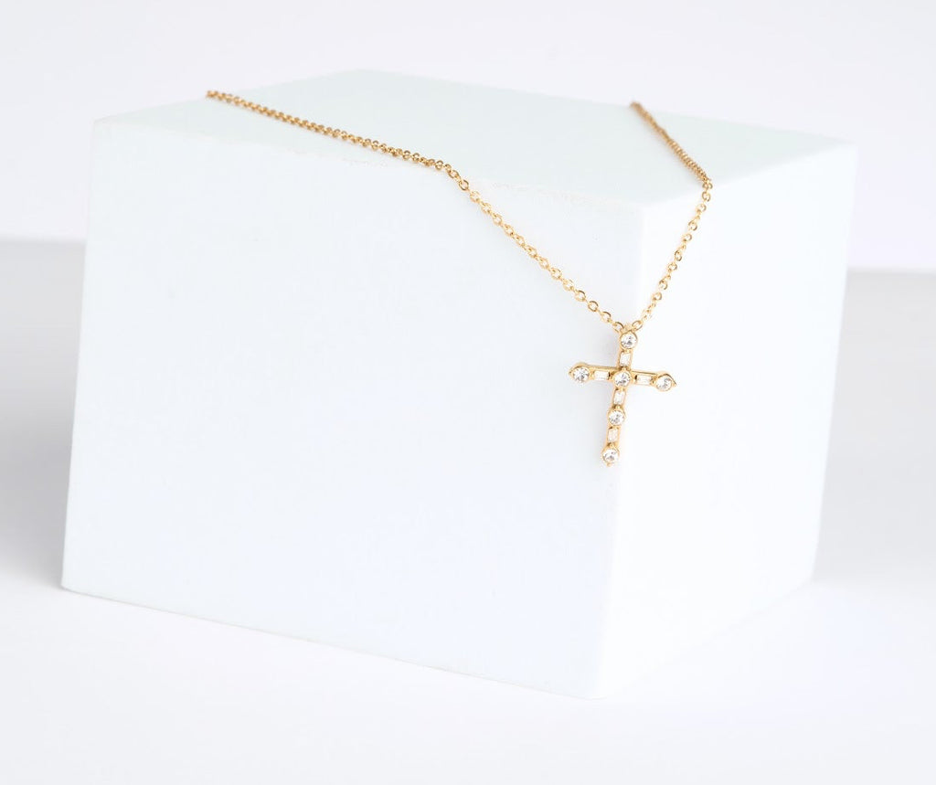 Gold necklace on a white background